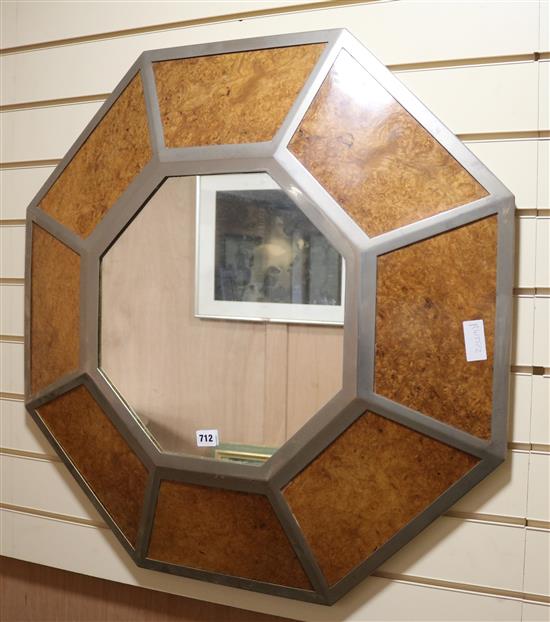 An octagonal burr walnut and metal mirror, W.81cm